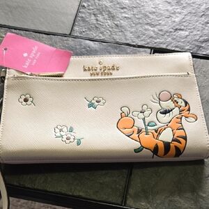 Kate Spade Cream Wristlet with Tigger and Floral Design